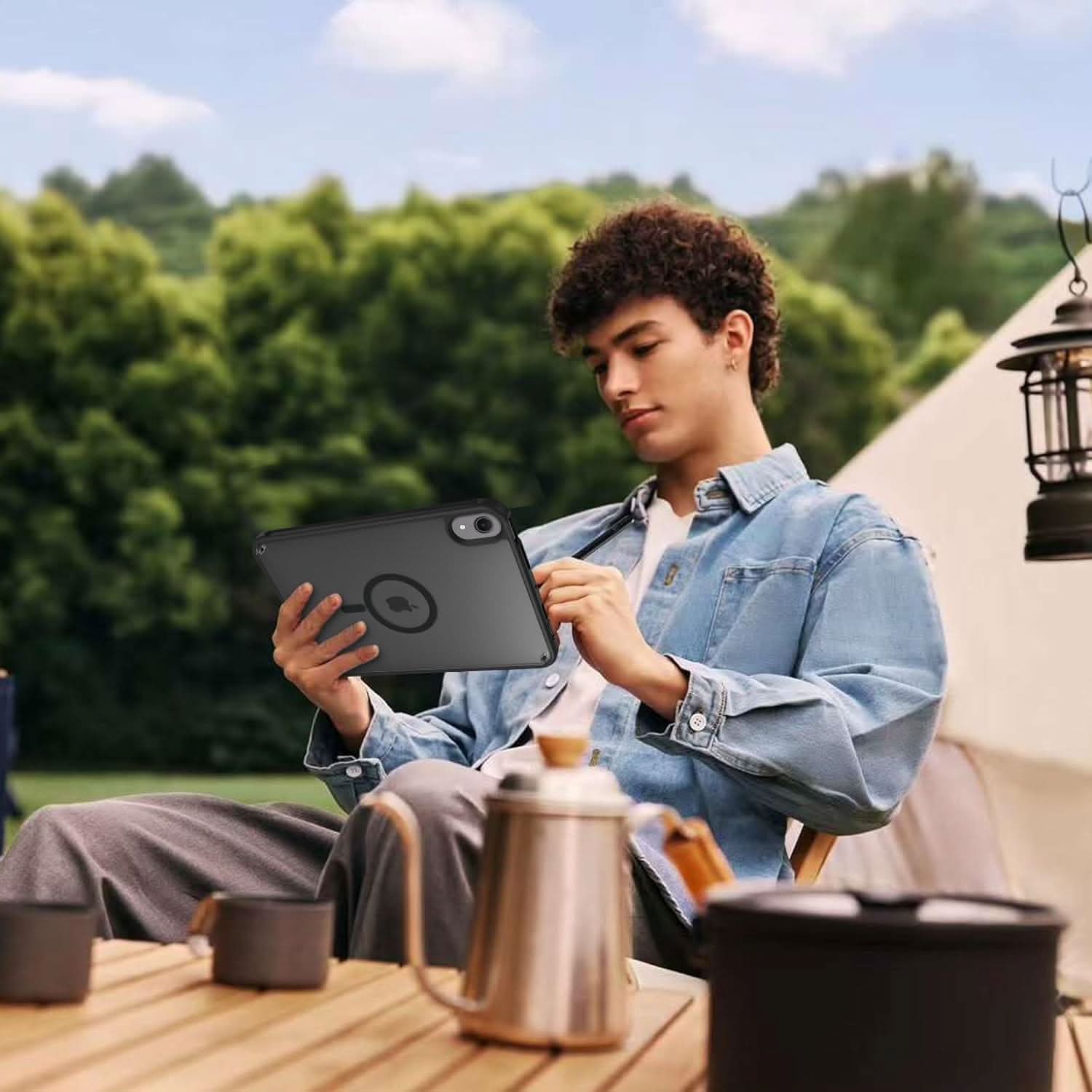 Dark grey translucent iPad Mini case with a magnetic ring.