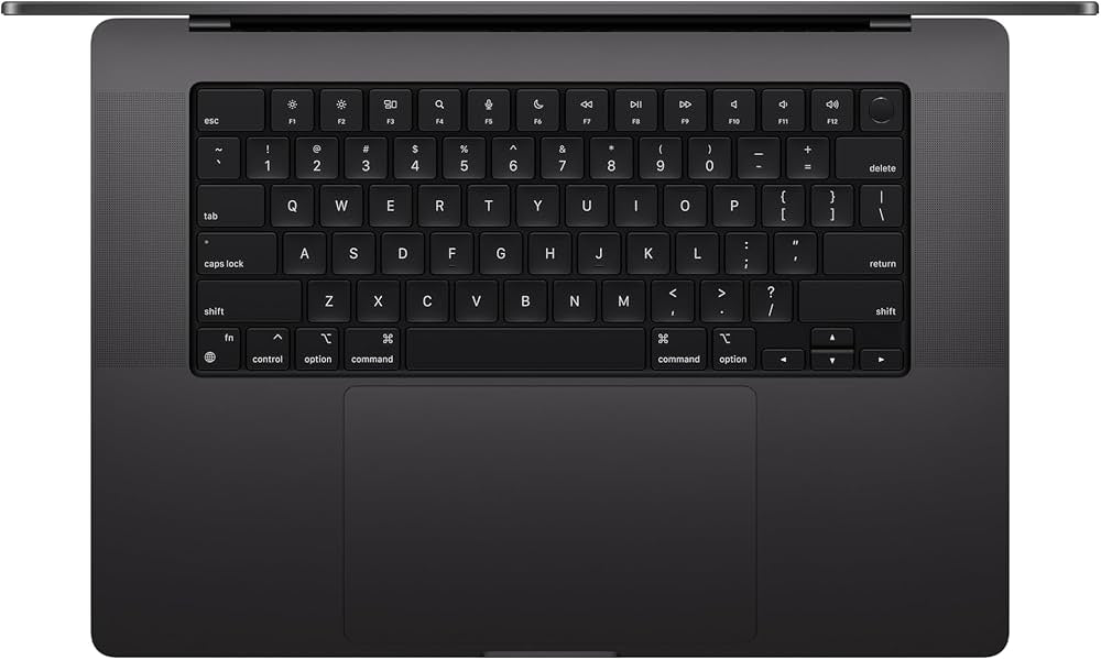 Top-down view of a Space Black MacBook Pro keyboard and trackpad.